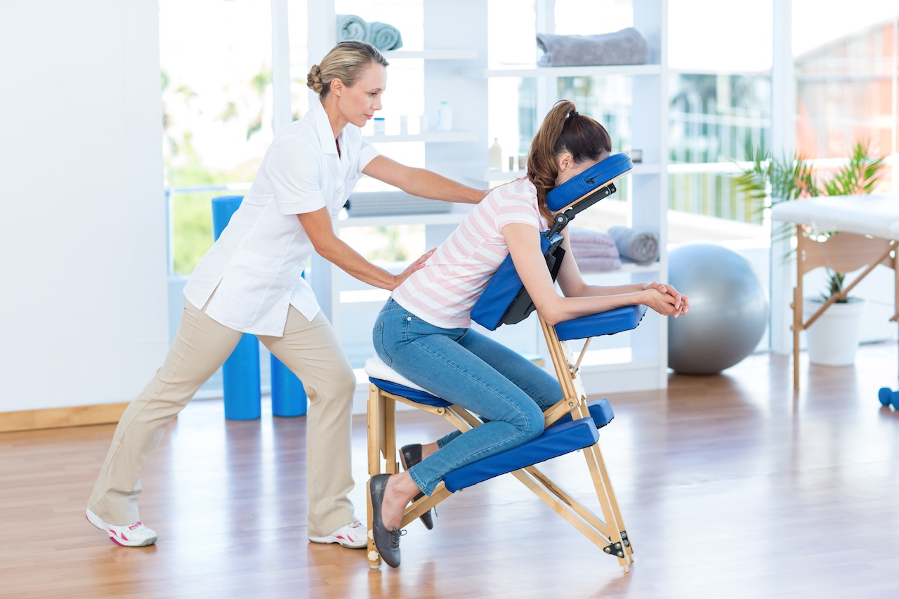 Woman having back massage